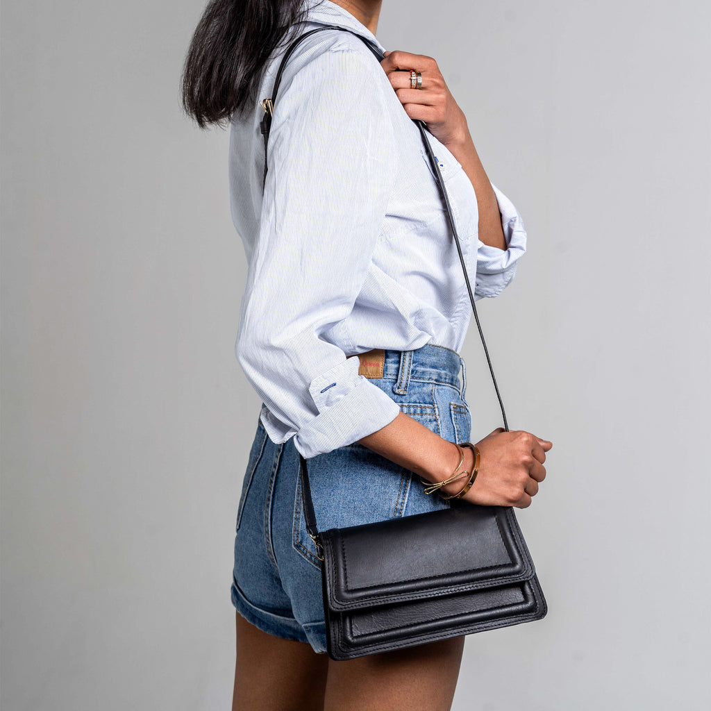 Black leather mini crossbody bag handmade from upcycled leather in Delhi, India