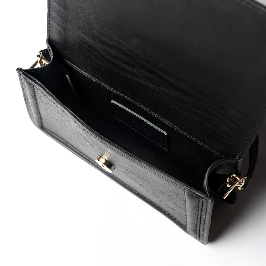 Black leather mini crossbody bag handmade from upcycled leather in Delhi, India