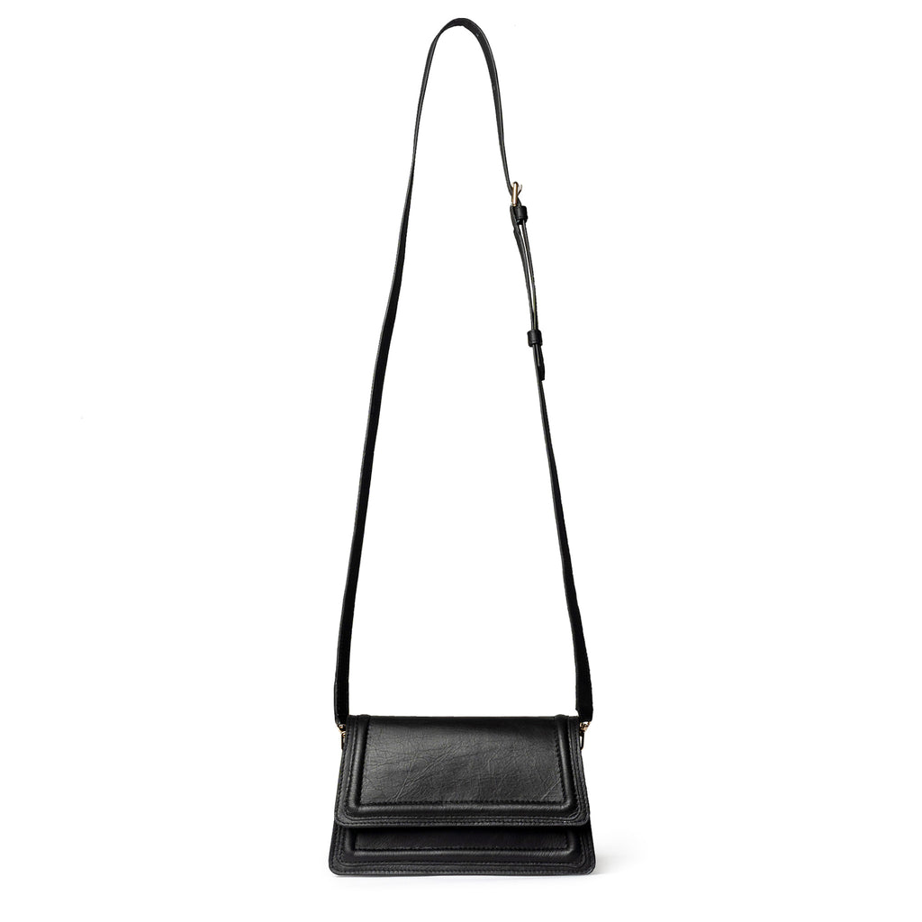 Black leather mini crossbody bag handmade from upcycled leather in Delhi, India